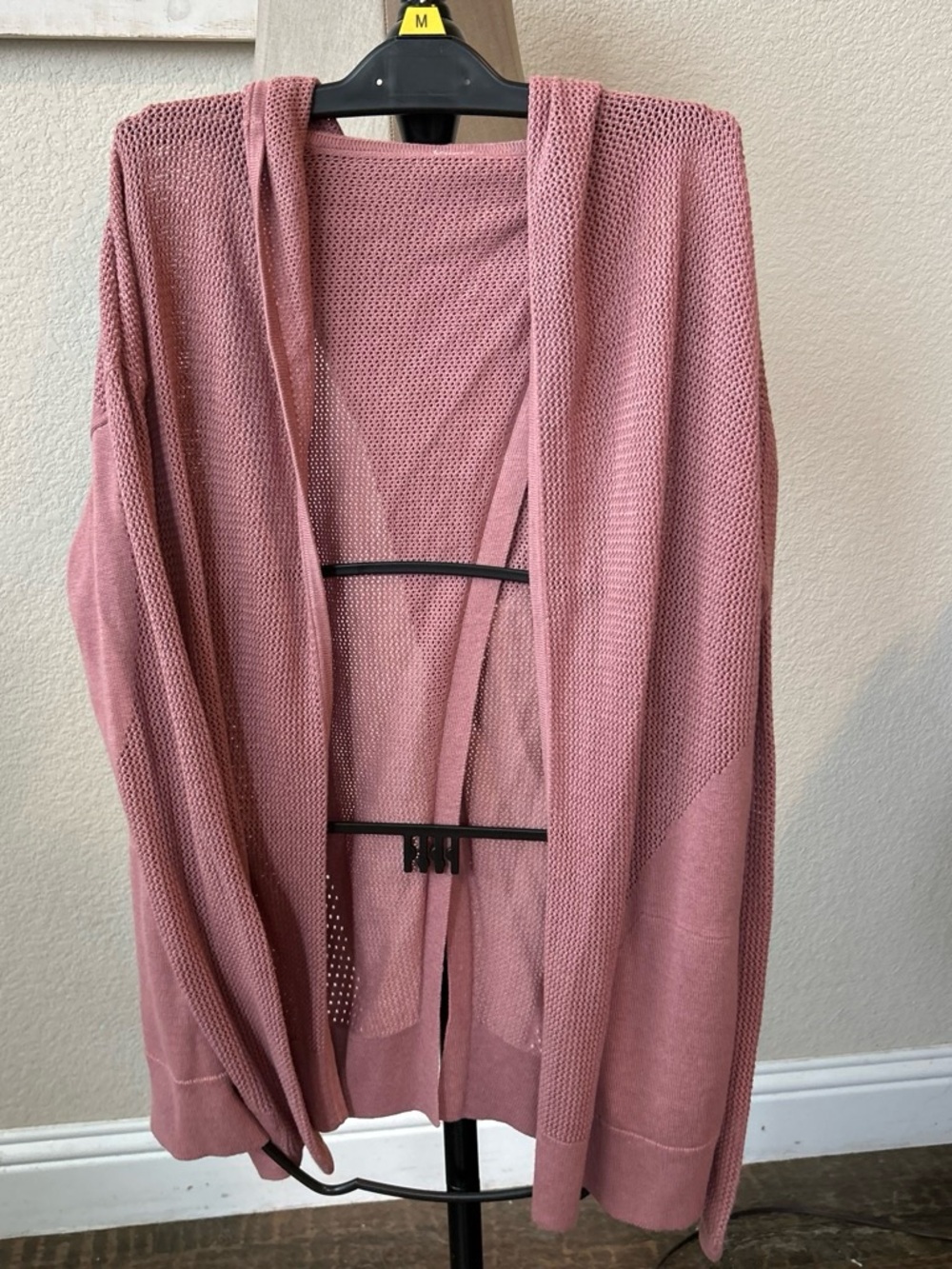 Lululemon cardigan, split back.